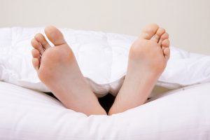 feet in bed